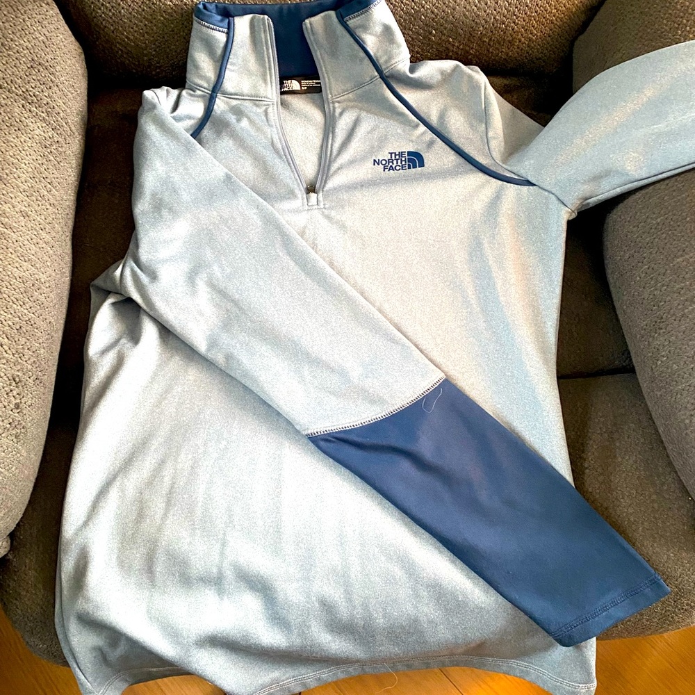 Size small North Face quarter zip. Worn a few times. Nice material.